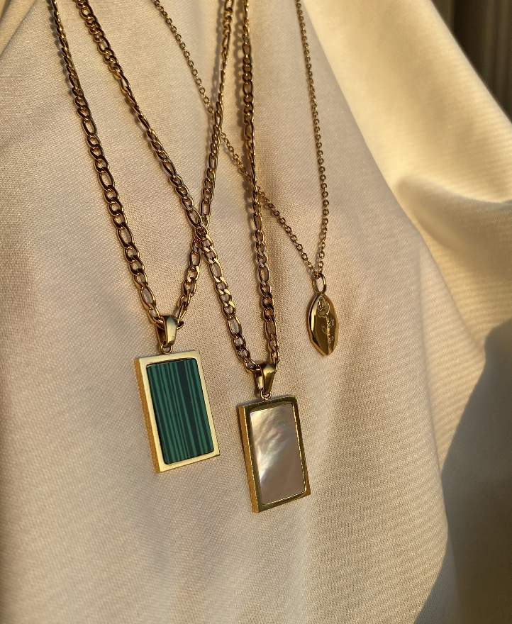 Our Malachite Pendant Necklace, Ophelia Pendant Necklace, and Celé Rose Pendant Necklace