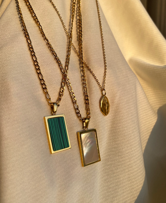 Our Malachite Pendant Necklace, Ophelia Pendant Necklace, and Celé Rose Pendant Necklace